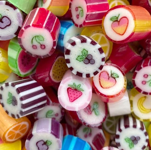 A close-up of sticky candy, highlighting its chewy texture and sugary appearance.