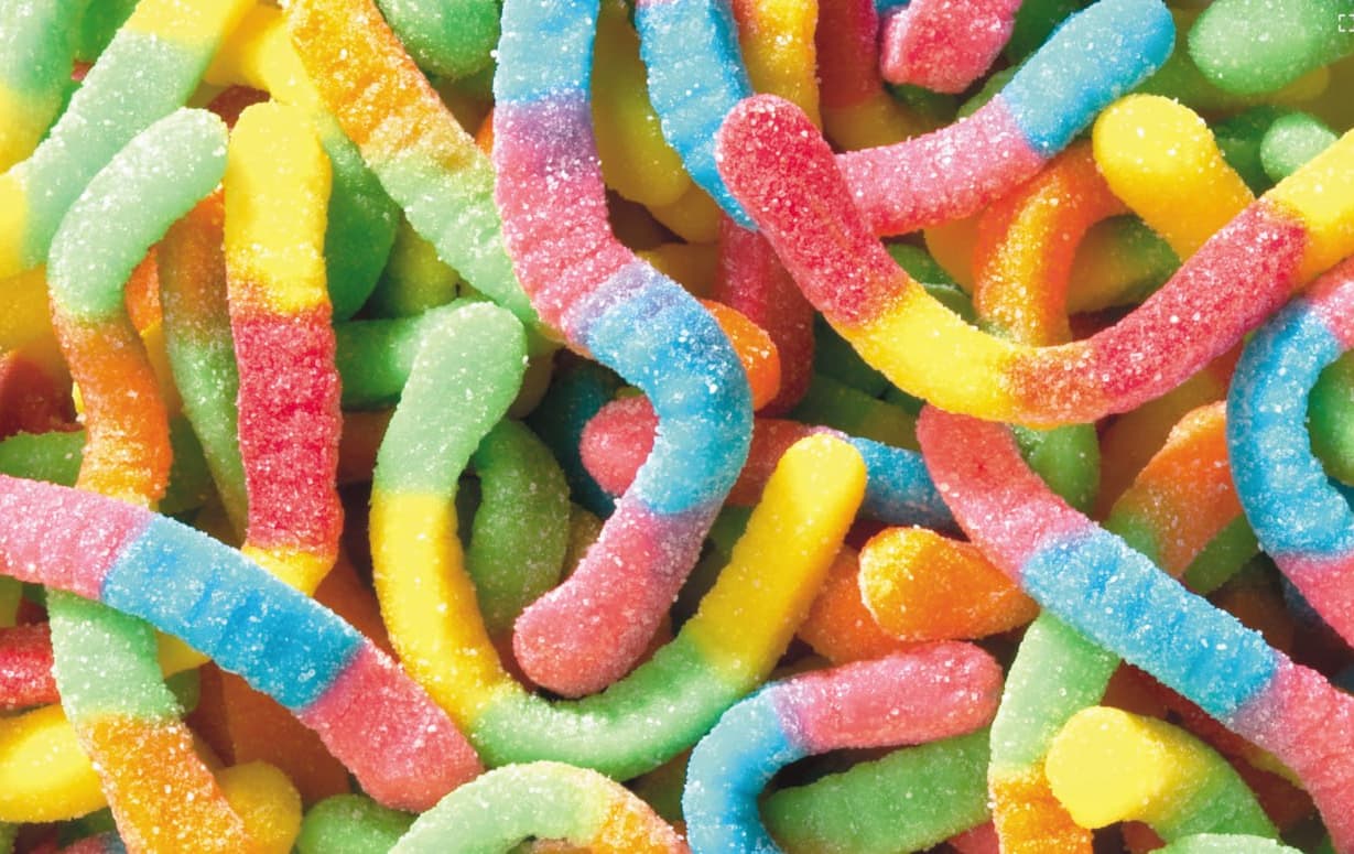 A visual guide showing different types of candy that should be avoided with braces, including sticky, hard, and chewy candies