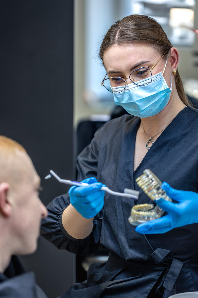 Adult patient receiving orthodontic consultation and smile evaluation in dental clinic