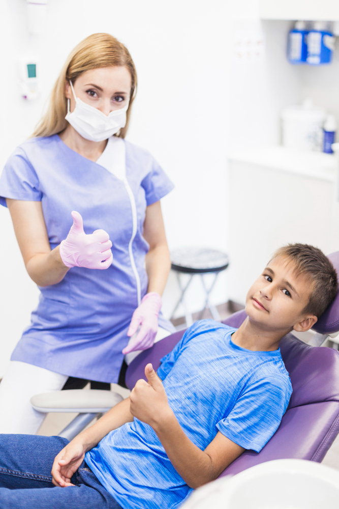 Child receiving gentle orthodontic braces treatment in a Queens NY clinic